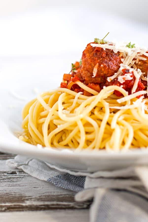 Homemade turkey meatballs in a smokey tomato sauce over spaghetti.