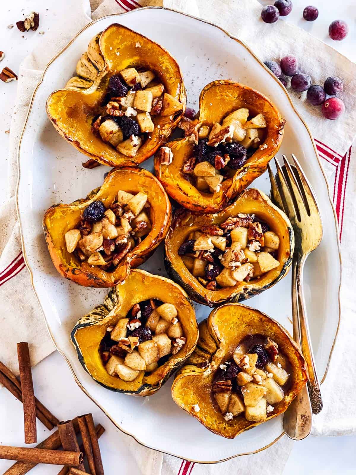 white serving platter with stuffed acorn squash