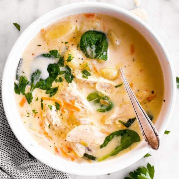 overhead photo of white bowl filled with chicken gnocchi soup