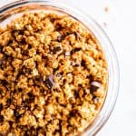 Peanut Butter Granola on the counter in a jar.