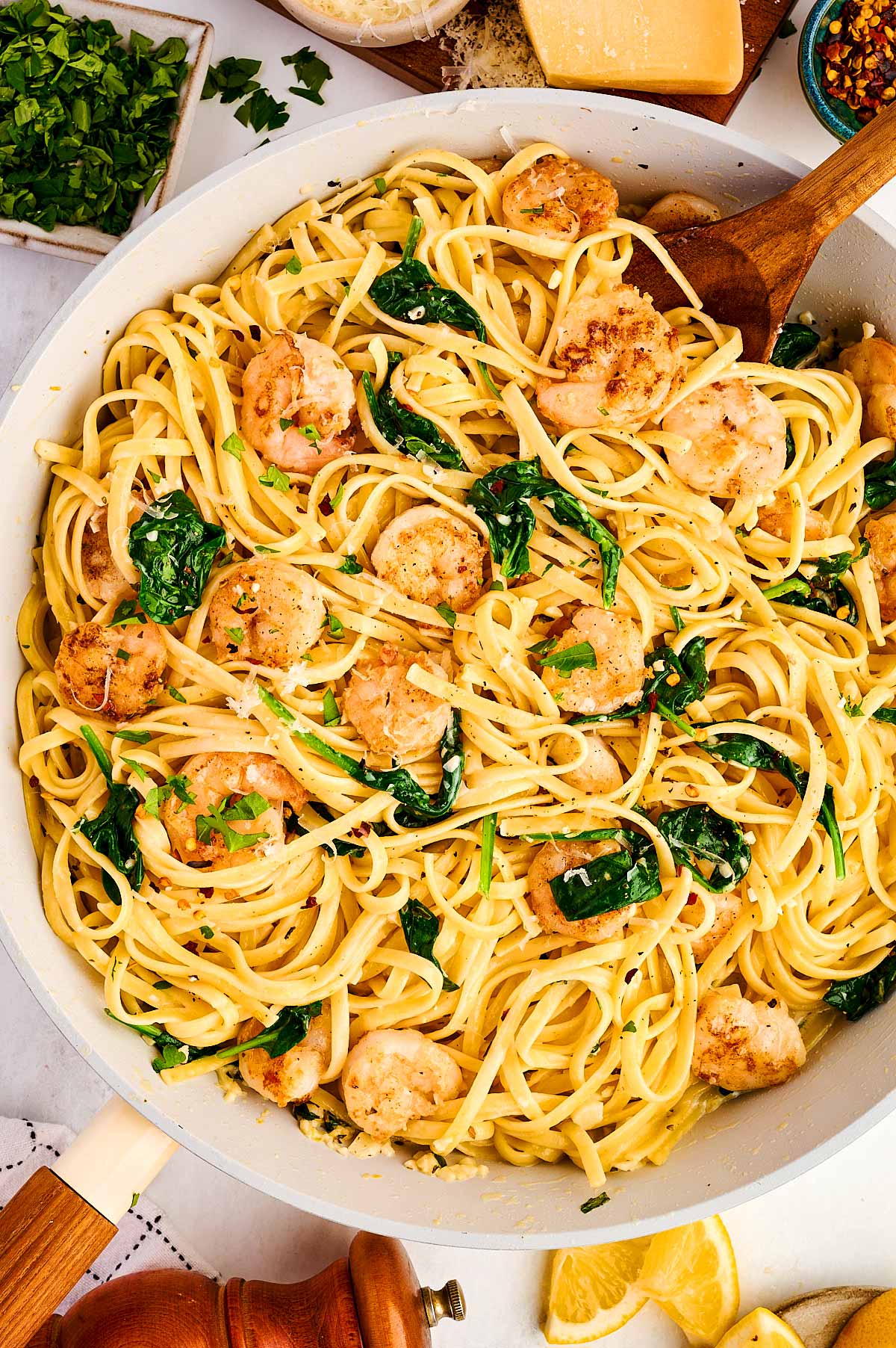 Skillet with garlic butter shrimp pasta.
