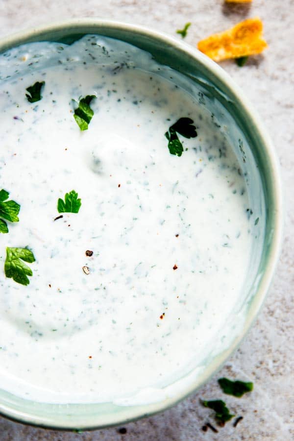 Close up photo of a bowl of ranch dip.