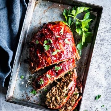 bacon wrapped meatloaf in a casserole dish
