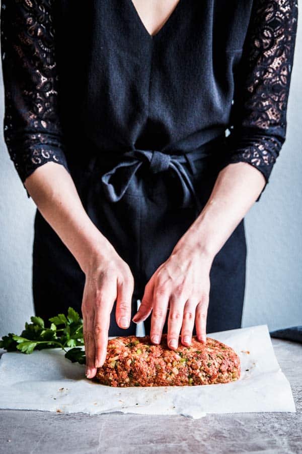 shaping bacon wrapped meatloaf