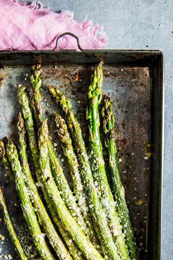 Parmesan Roasted Asparagus on a metal sheet pan.