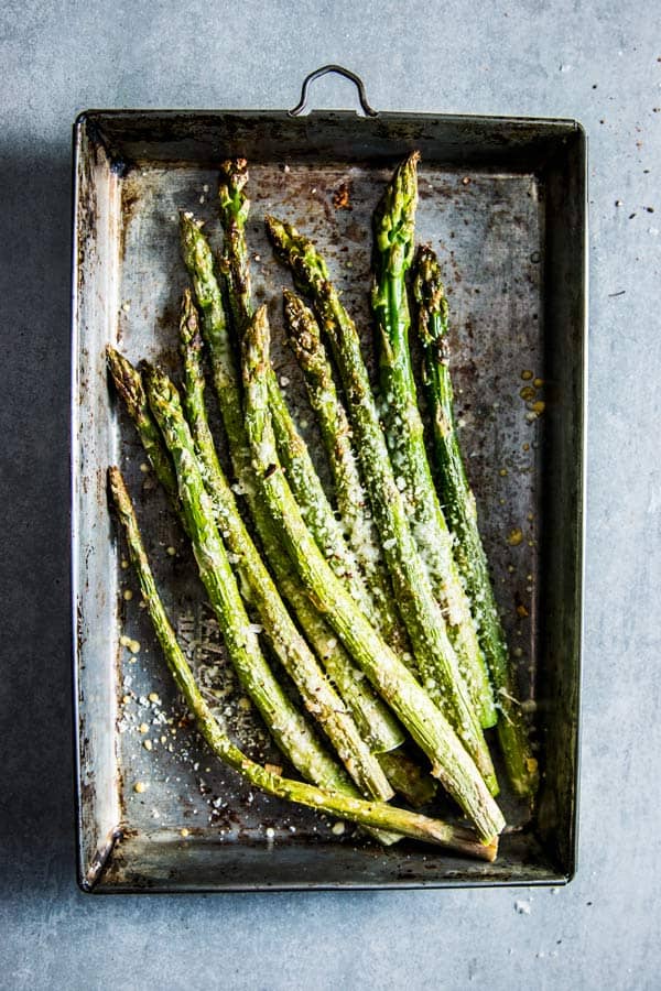 Parmesan Roasted Asparagus on a metal sheet pan.