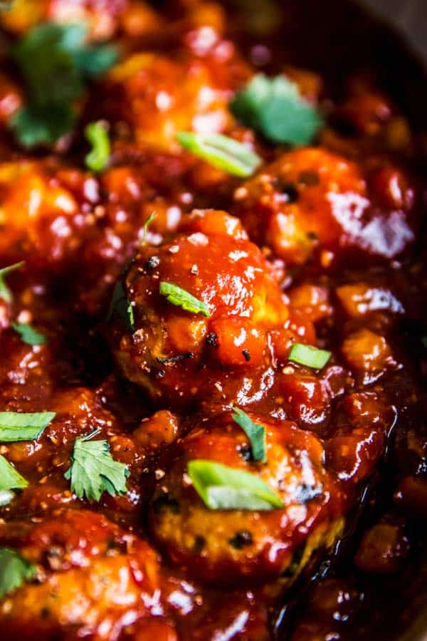 Close up photos of Pineapple BBQ Meatballs in a skillet.