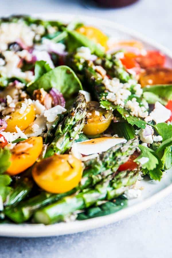 Close up photo of Quinoa Spinach Salad with Asparagus.