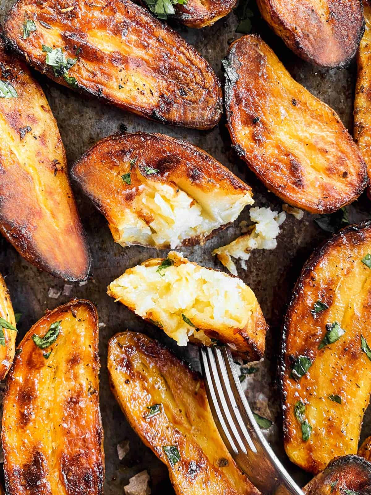 halved fingerling potato with fork stuck in