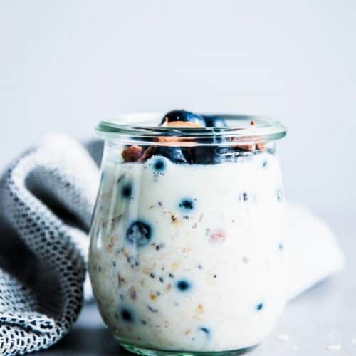 Blueberry Overnight Oats in a glass jar.
