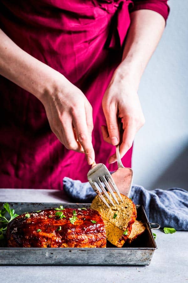 Woman in a red dress Erving bbq turkey meatloaf
