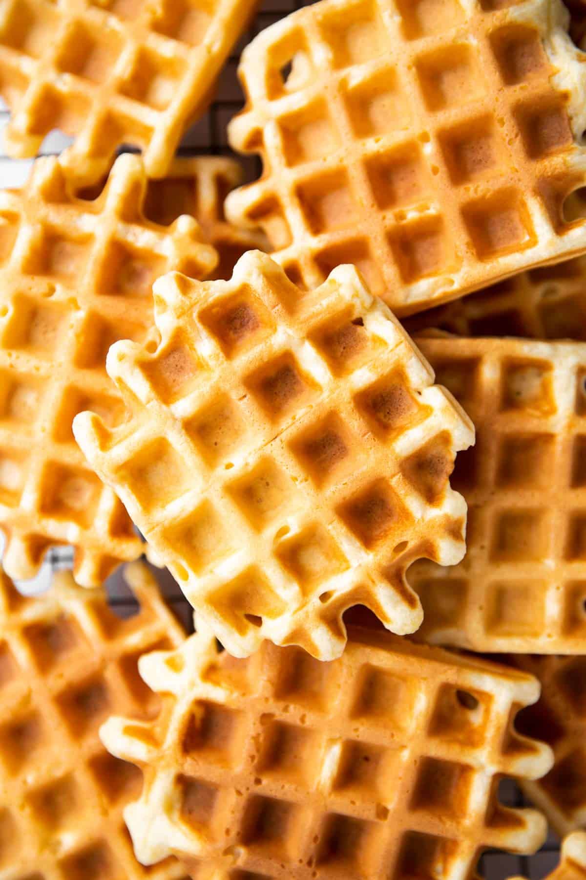 close up photo of buttermilk waffles on cooling rack