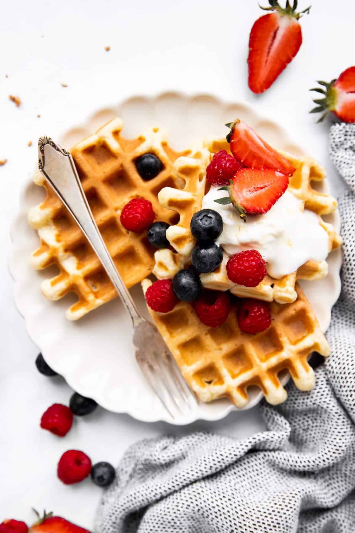 plate with waffles and berries