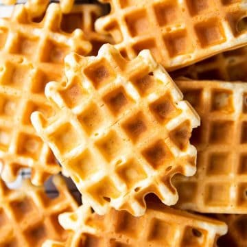 close up photo of buttermilk waffles on cooling rack