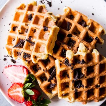 Chocolate Chip Waffles on a white plate.