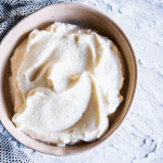 Homemade whipped cream in a bowl.