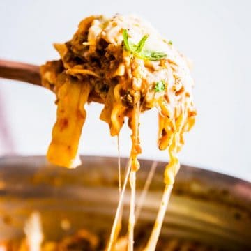 Skillet lasagna on a wooden spoon