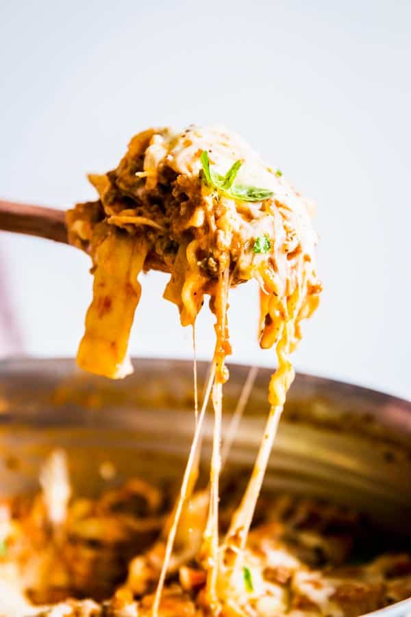 Skillet lasagna on a wooden spoon