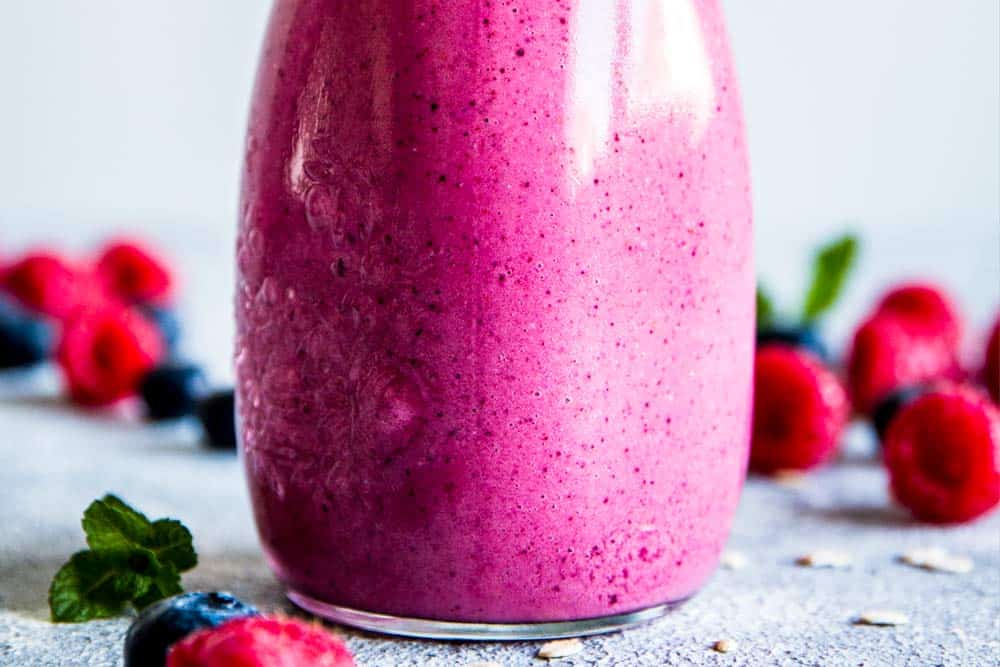 close up photo of berry smoothie