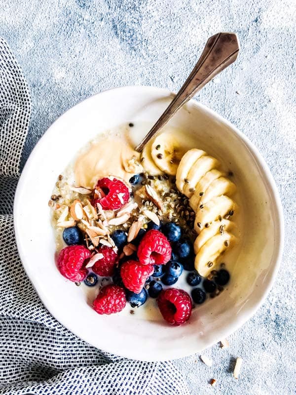 Berry quinoa breakfast bowl on the counter.