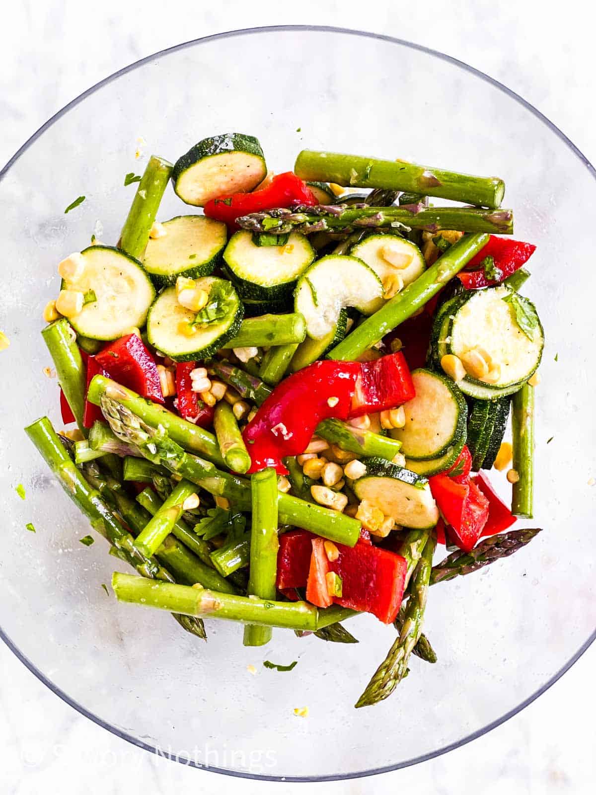 seasoned vegetables in glass bowl