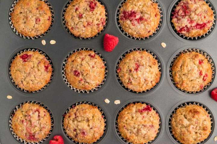 baked raspberry oatmeal muffins in pan