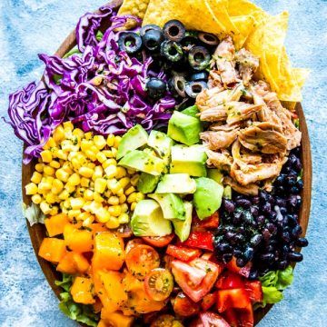 chicken taco salad on a wooden plate