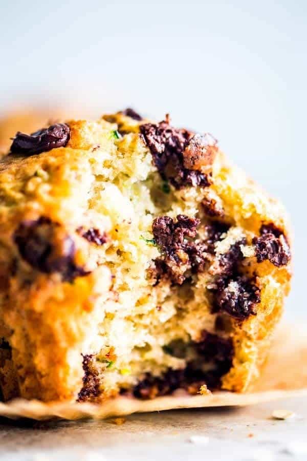 chocolate chip zucchini muffin with a bite taken out