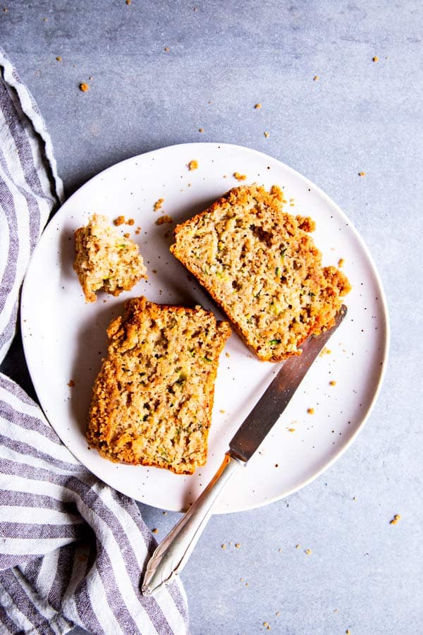 cinnamon crunch zucchini bread slices on a white plate