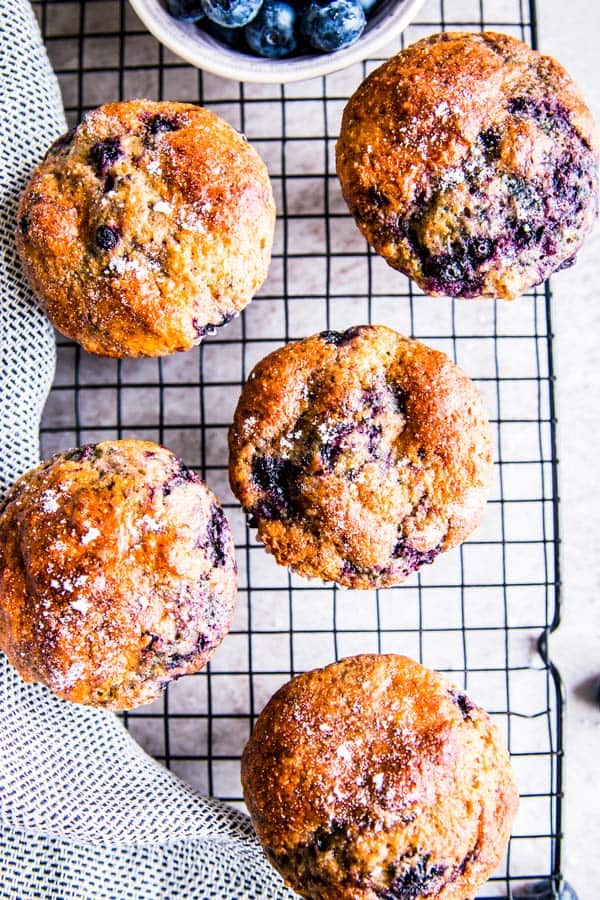 greek yogurt blueberry muffins on a cooling rack