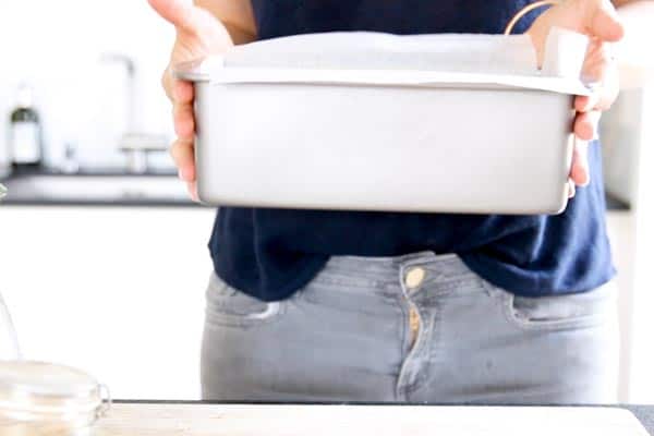 woman holding a loaf pan