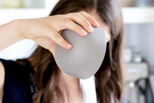 pouring sugar into a bowl