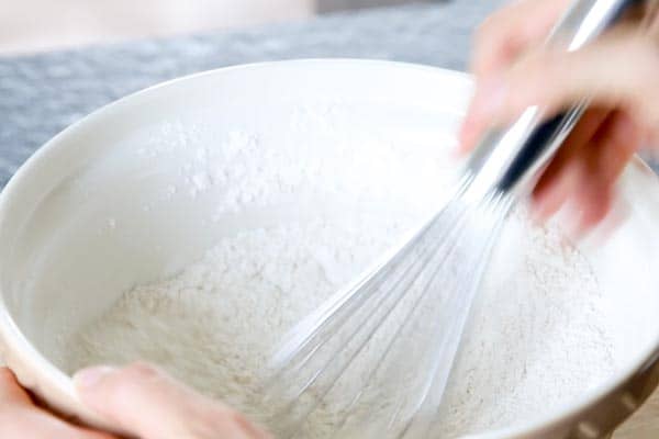 whisking dry ingredients for zucchini bread