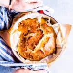 holding a dutch oven with no knead bread