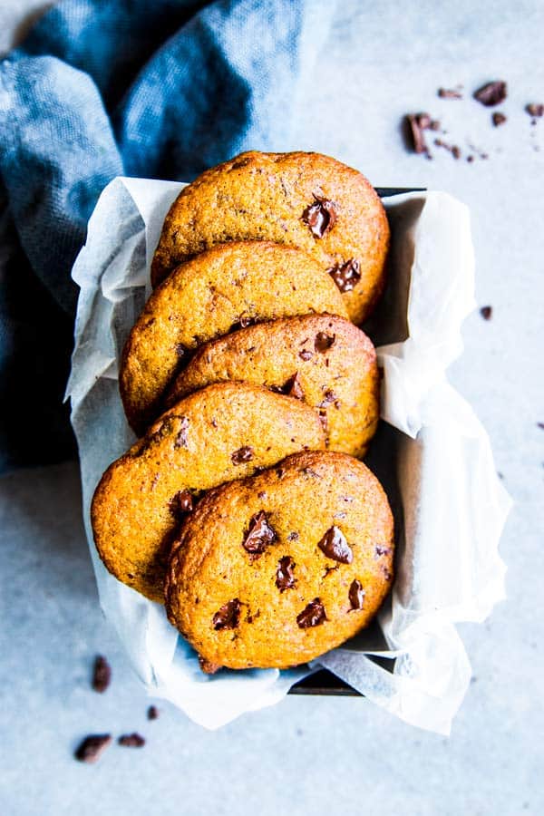 pumpkin chocolate chip cookies in a tin