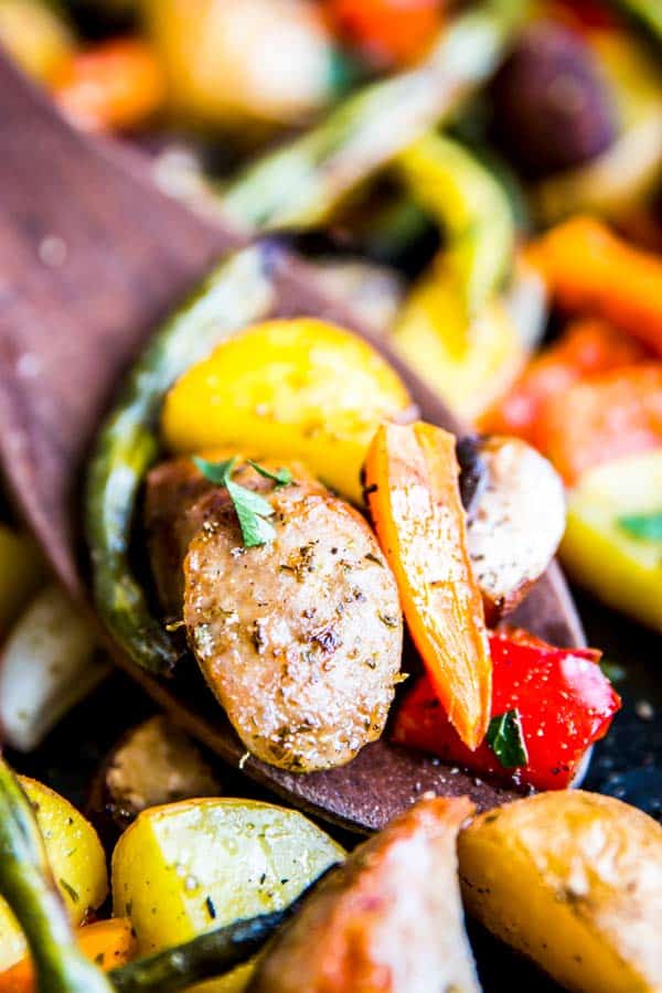 close up photo of sausage potato and vegetables sheet pan dinner