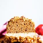 sliced applesauce bread on a wooden board