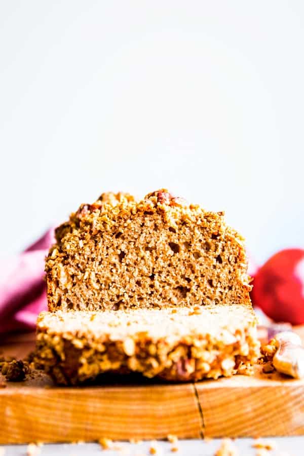 sliced applesauce bread on a wooden board