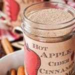 jam jar with a homemade label, filled with diy apple cider spice mix