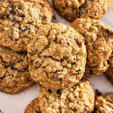 overhead closeup of pile of oatmeal raisin cookies