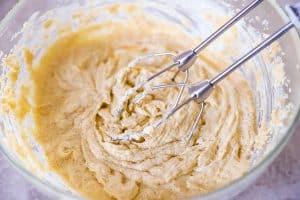 creamed butter, sugar and egg in a glass bowl with beaters from an electric mixer