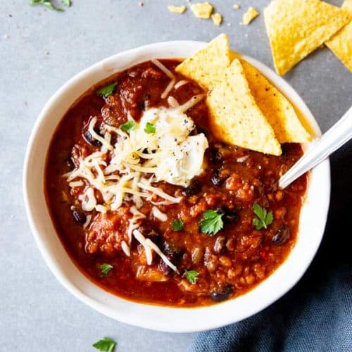 instant pot pumpkin chili in a white bowl