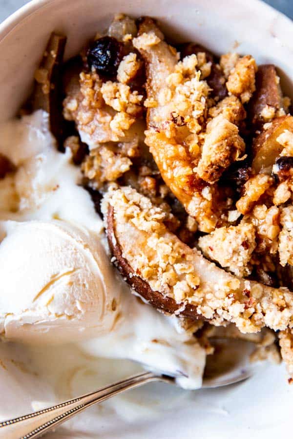 pear crisp with ice cream in a bowl