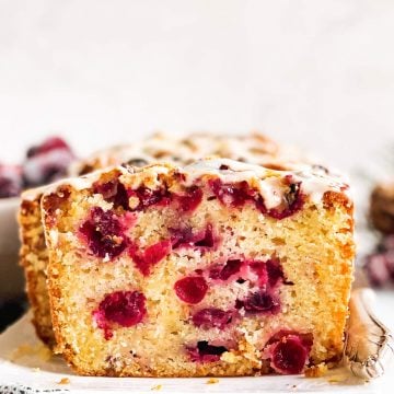 frontal view of sliced open cranberry orange bread