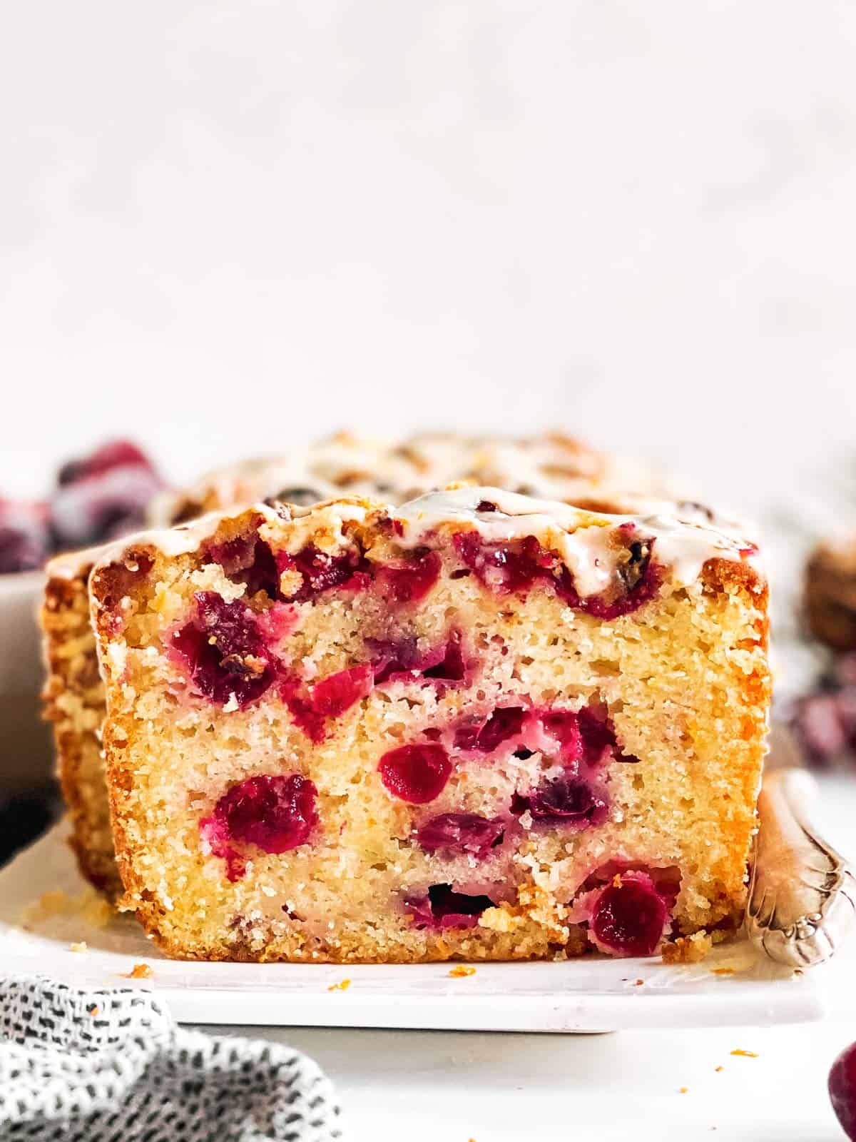 frontal view of sliced open cranberry orange bread