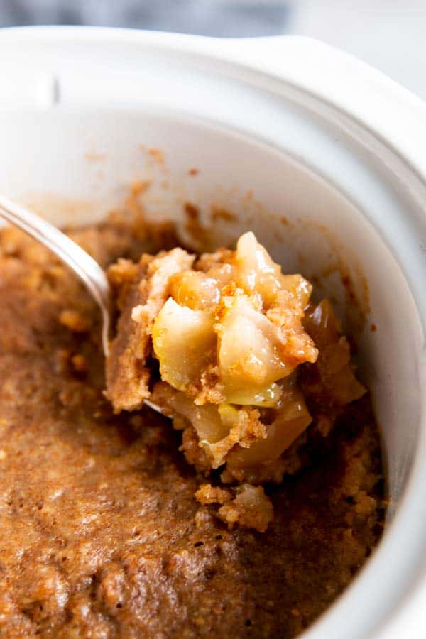 apple cobbler in a white crockpot