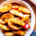 cinnamon apples in a white bowl