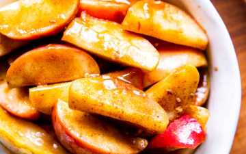 cinnamon apples in a white bowl