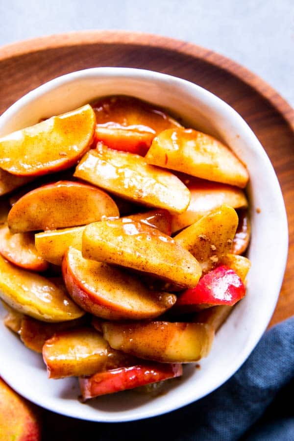 cinnamon apples in a white bowl