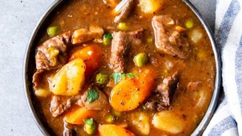 instant pot beef stew on a black plate